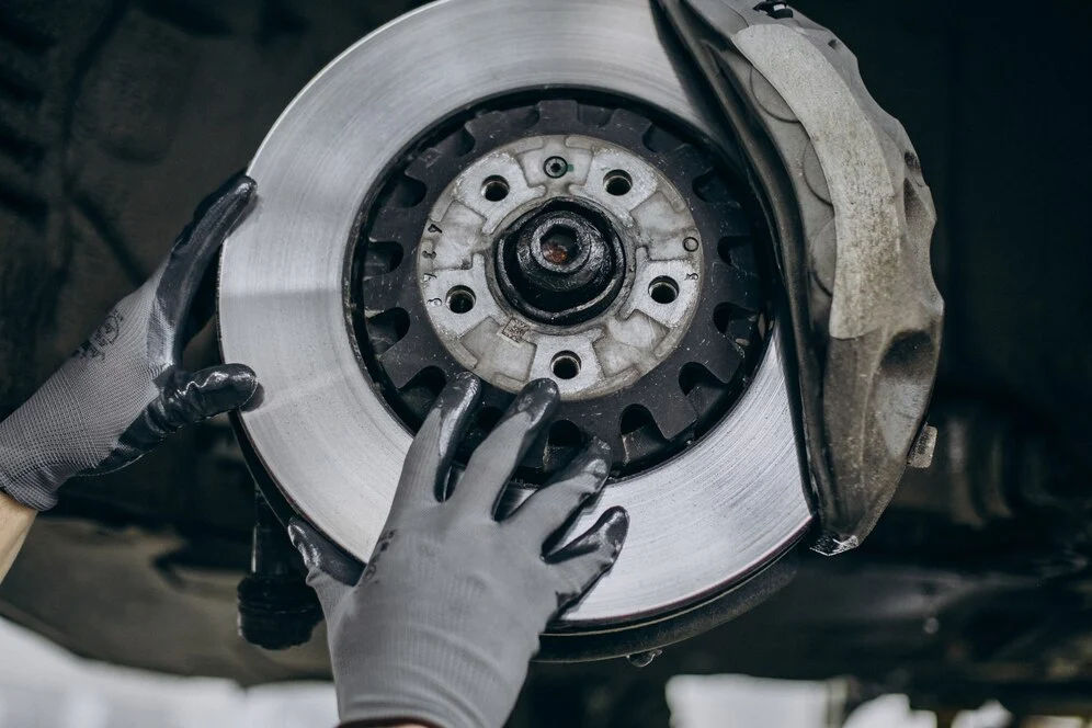 mechanic changing brake discs ca